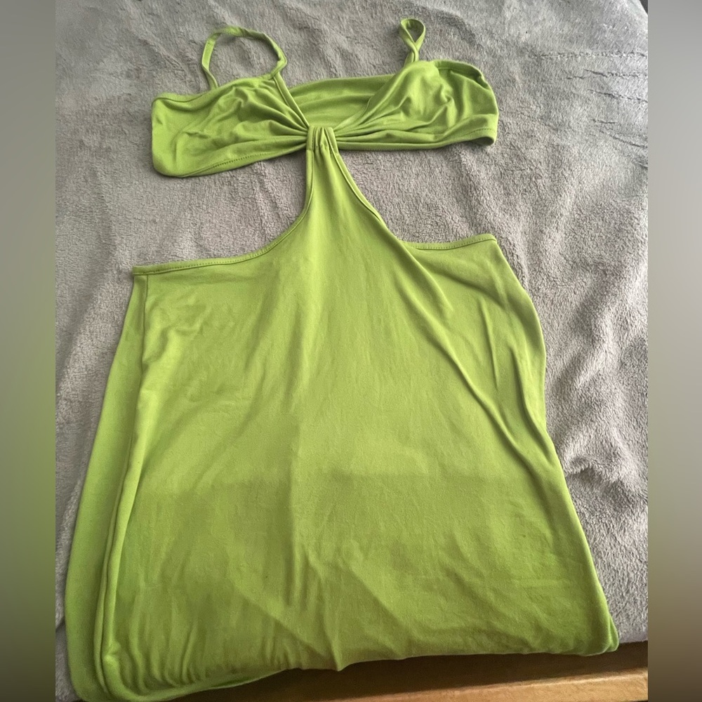 I am selling a body con lime green dress , size : large . Only wore 1 or 2 times